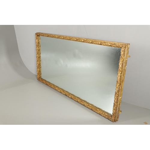 1284 - A SUBSTANTIAL LATE VICTORIAN GILT AND GESSO FRAMED WALL MIRROR. the pine frame with oak leaf and aco... 