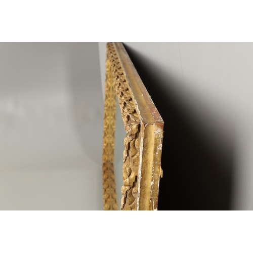 1284 - A SUBSTANTIAL LATE VICTORIAN GILT AND GESSO FRAMED WALL MIRROR. the pine frame with oak leaf and aco... 