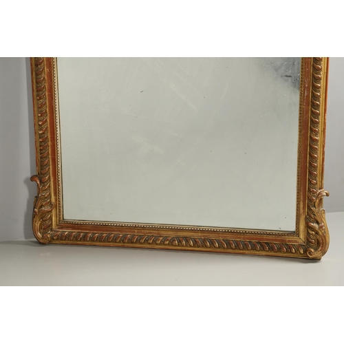 1286 - A LATE 19TH CENTURY GILT GESSO OVERMANTEL MIRROR. the shaped upright rectangular plate within beaded... 