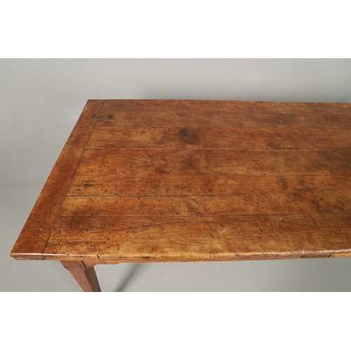 1295 - A 19TH CENTURY FRENCH FRUITWOOD DRAWLEAF FARMHOUSE TABLE. the six plank top to a single drawer at on... 