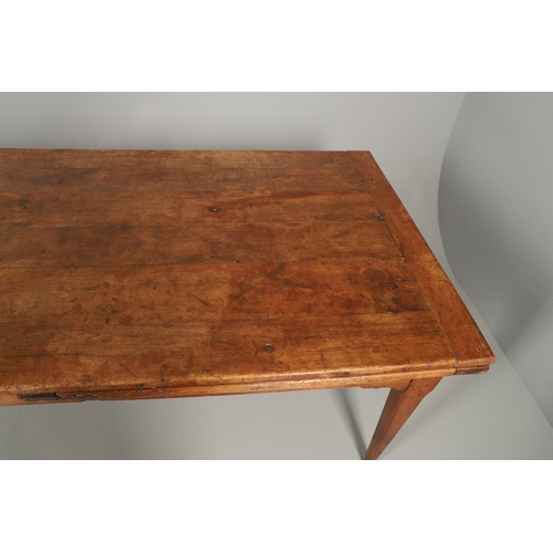 1295 - A 19TH CENTURY FRENCH FRUITWOOD DRAWLEAF FARMHOUSE TABLE. the six plank top to a single drawer at on... 