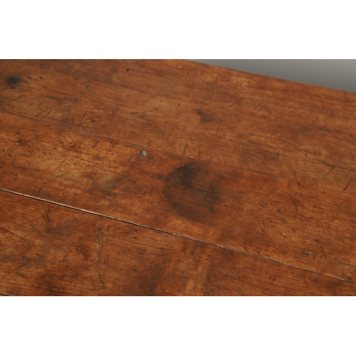 1295 - A 19TH CENTURY FRENCH FRUITWOOD DRAWLEAF FARMHOUSE TABLE. the six plank top to a single drawer at on... 