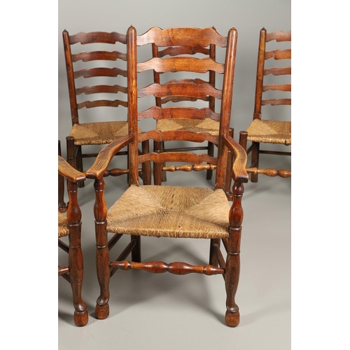 1296 - A SET OF EIGHT OAK AND ELM LADDERBACK DINING CHAIRS. early 20th century, comprising six singles and ... 