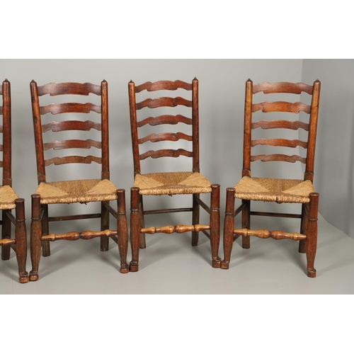 1296 - A SET OF EIGHT OAK AND ELM LADDERBACK DINING CHAIRS. early 20th century, comprising six singles and ... 