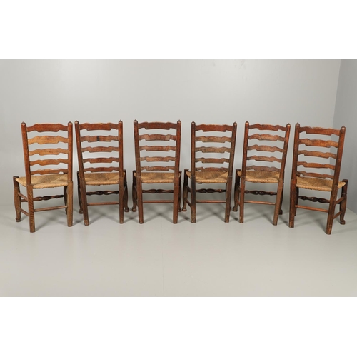 1296 - A SET OF EIGHT OAK AND ELM LADDERBACK DINING CHAIRS. early 20th century, comprising six singles and ... 