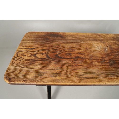 1297 - AN EARLY 20TH CENTURY ELM FARMHOUSE TABLE. the single plank top to a painted stretchered base with X... 