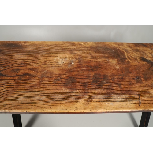 1297 - AN EARLY 20TH CENTURY ELM FARMHOUSE TABLE. the single plank top to a painted stretchered base with X... 