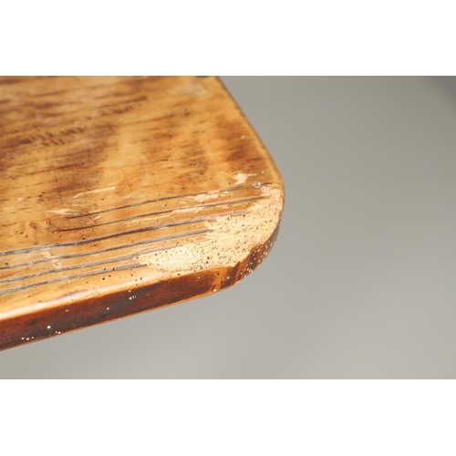 1297 - AN EARLY 20TH CENTURY ELM FARMHOUSE TABLE. the single plank top to a painted stretchered base with X... 