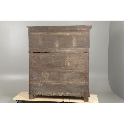 1298 - AN 18TH CENTURY OAK COURT CUPBOARD. the panelled top section with twin cupboards enclosing a vacant ... 