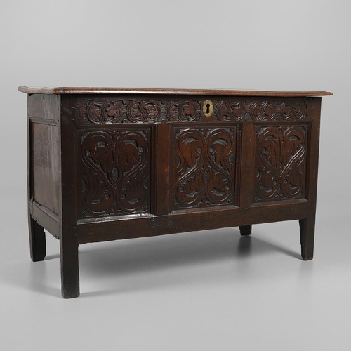 1301 - A LATE 17TH CENTURY OAK COFFER. the triple plank top enclosing an interior with candle box, over a t... 