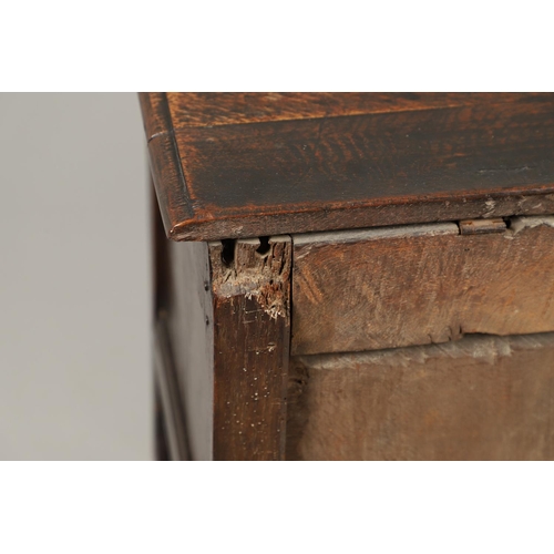 1301 - A LATE 17TH CENTURY OAK COFFER. the triple plank top enclosing an interior with candle box, over a t... 