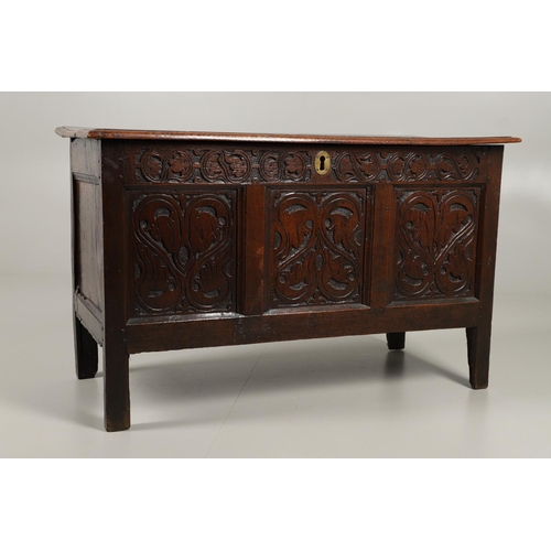 1301 - A LATE 17TH CENTURY OAK COFFER. the triple plank top enclosing an interior with candle box, over a t... 