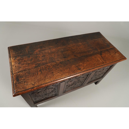 1301 - A LATE 17TH CENTURY OAK COFFER. the triple plank top enclosing an interior with candle box, over a t... 