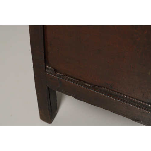 1301 - A LATE 17TH CENTURY OAK COFFER. the triple plank top enclosing an interior with candle box, over a t... 