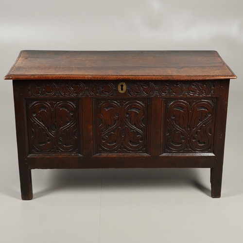 1301 - A LATE 17TH CENTURY OAK COFFER. the triple plank top enclosing an interior with candle box, over a t... 