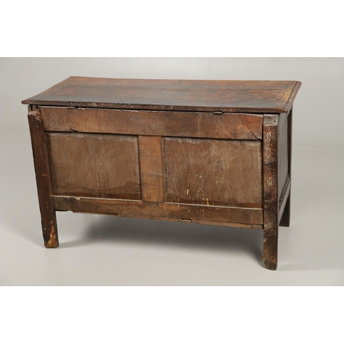 1301 - A LATE 17TH CENTURY OAK COFFER. the triple plank top enclosing an interior with candle box, over a t... 