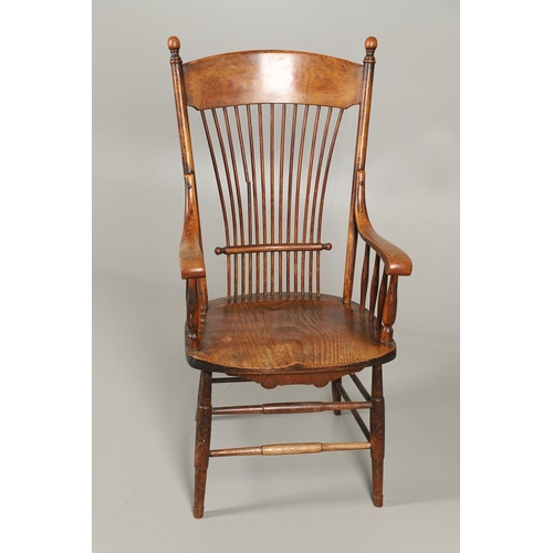 1302 - A 19TH CENTURY AMERICAN ASH AND ELM STICK BACK CHAIR. of large proportions, the spindle back on scro... 