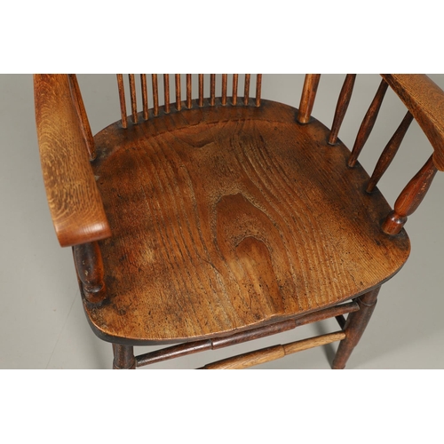 1302 - A 19TH CENTURY AMERICAN ASH AND ELM STICK BACK CHAIR. of large proportions, the spindle back on scro... 