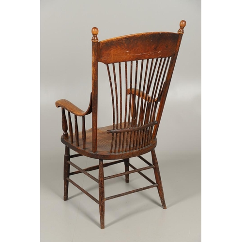 1302 - A 19TH CENTURY AMERICAN ASH AND ELM STICK BACK CHAIR. of large proportions, the spindle back on scro... 