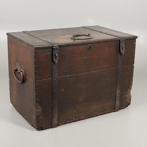 1303 - AN 18TH CENTURY OAK AND IRON BOUND SILVER CHEST. the hinged plank lid and sides with forged iron han... 