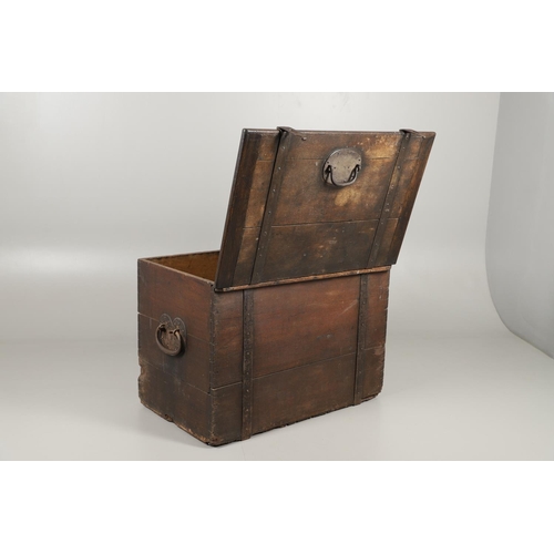 1303 - AN 18TH CENTURY OAK AND IRON BOUND SILVER CHEST. the hinged plank lid and sides with forged iron han... 