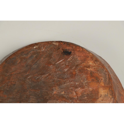 1304 - A LARGE RUSTIC CARVED HARDWOOD BOWL. possibly African, height 10cm, diameter 51cm.