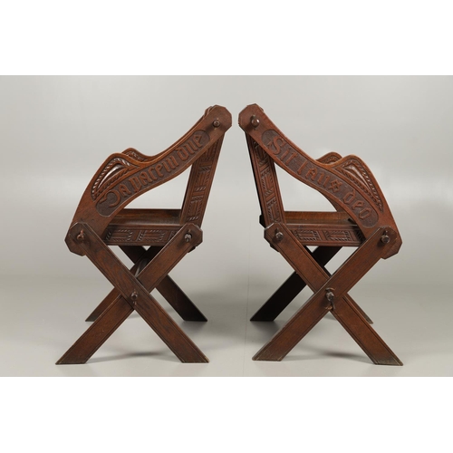 1309 - A PAIR OF VICTORIAN OAK GLASTONBURY CHAIRS. of typical pegged construction, the carved panel back ce... 