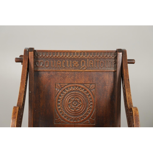 1309 - A PAIR OF VICTORIAN OAK GLASTONBURY CHAIRS. of typical pegged construction, the carved panel back ce... 