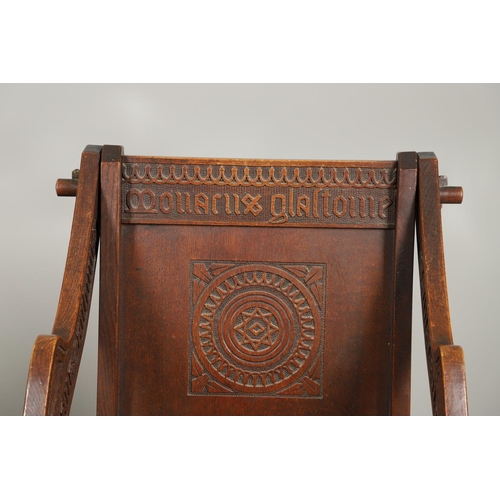 1309 - A PAIR OF VICTORIAN OAK GLASTONBURY CHAIRS. of typical pegged construction, the carved panel back ce... 