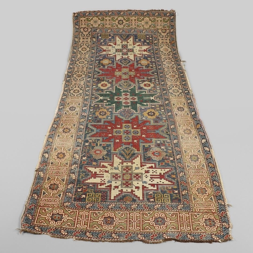 1316 - A SHIRVAN RUG, SOUTH EAST CAUCASUS, CIRCA 1920. the indigo field with five Lesghi stars surrounded b... 