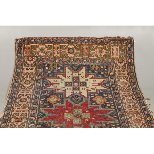 1316 - A SHIRVAN RUG, SOUTH EAST CAUCASUS, CIRCA 1920. the indigo field with five Lesghi stars surrounded b... 