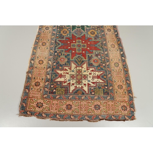 1316 - A SHIRVAN RUG, SOUTH EAST CAUCASUS, CIRCA 1920. the indigo field with five Lesghi stars surrounded b... 