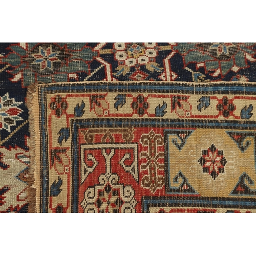 1326 - AN AFSHAN KUBA KHELLEH, NORTH EAST CAUCASUS, CIRCA 1900. the deep indigo field richly decorated with... 