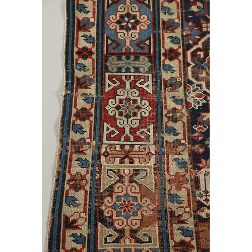 1326 - AN AFSHAN KUBA KHELLEH, NORTH EAST CAUCASUS, CIRCA 1900. the deep indigo field richly decorated with... 