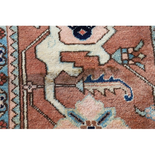 1332 - A WEST ANATOLIAN CARPET OF UNUSUAL SIZE, CIRCA 1980. the cream field with columns of heraldic motifs... 