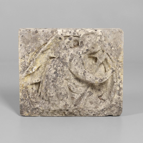 1336 - A CARVED LIMESTONE PANEL. 16th century, possibly earlier, depicting an angel in relief, 40cm x 35cm.