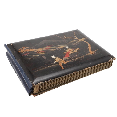 518 - A LATE 19TH/EARLY 20TH CENTURY JAPANESE/CHINESE POSTCARD ALBUM. A large Japanese lacquered album con... 