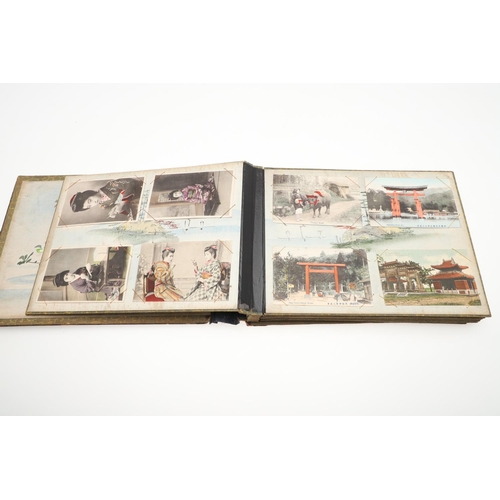 518 - A LATE 19TH/EARLY 20TH CENTURY JAPANESE/CHINESE POSTCARD ALBUM. A large Japanese lacquered album con... 