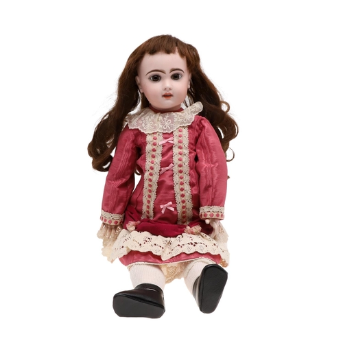 525A - FRENCH JUMEAU BISQUE HEAD DOLL. The large doll with fixed almond glass eyes, open mouth and pierced ... 