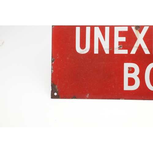 529 - VINTAGE ENAMEL SIGN - 'KEEP CLEAR UNEXPLODED BOMB'. A vintage red enamel sign with white lettering, ... 