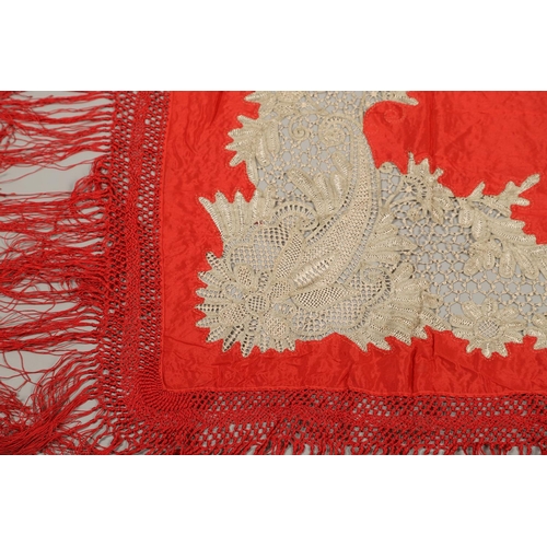 561 - ANTIQUE RED SILK & EMBROIDERED SHAWL. Probably late 19thc, the dark red silk fringed shawl with poss... 