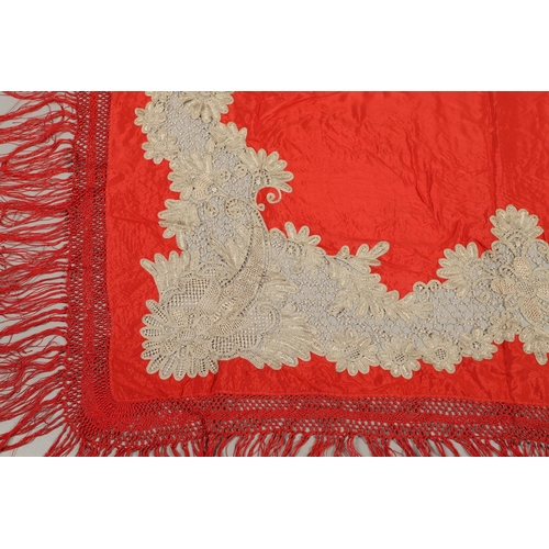 561 - ANTIQUE RED SILK & EMBROIDERED SHAWL. Probably late 19thc, the dark red silk fringed shawl with poss... 