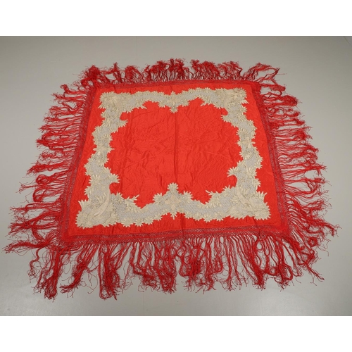 561 - ANTIQUE RED SILK & EMBROIDERED SHAWL. Probably late 19thc, the dark red silk fringed shawl with poss... 