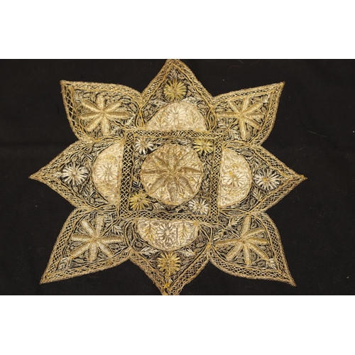 565 - EARLY 20THC INDIAN EMBROIDERED PANEL. A large gold coloured metallic embroidered panel, with a wide ... 