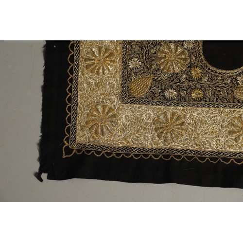 565 - EARLY 20THC INDIAN EMBROIDERED PANEL. A large gold coloured metallic embroidered panel, with a wide ... 