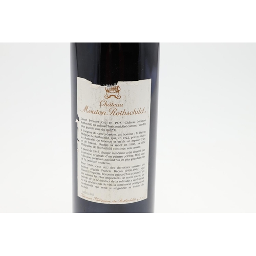 569 - CHATEAU MOUTON ROTHSCHILD 1990 - FRANCIS BACON. A single unopened bottle of Chateau Mouton Rothschil... 