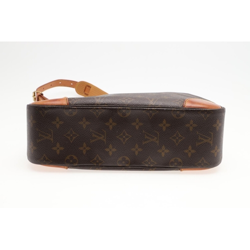 572 - LOUIS VUITTON 'BOULOGNE' SHOULDER BAG. A canvas monogrammed shoulder bag with leather corners and tr... 