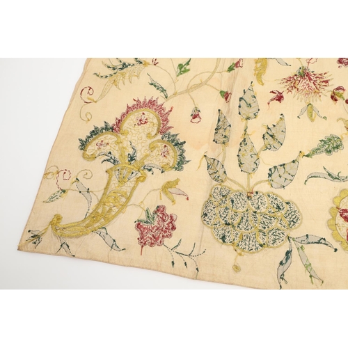 576 - 18THC SILK EMBROIDERED FLORAL PANEL. A small piece of 18thc embroidered silk which may have been par... 