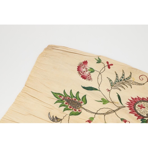 576 - 18THC SILK EMBROIDERED FLORAL PANEL. A small piece of 18thc embroidered silk which may have been par... 