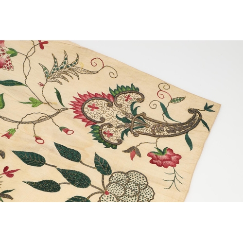 576 - 18THC SILK EMBROIDERED FLORAL PANEL. A small piece of 18thc embroidered silk which may have been par... 